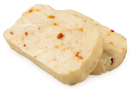 Two slices of halloumi cheese with red chilli isolated on white.の写真素材