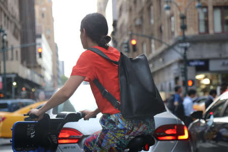 Woman Riding bicycle at Manhattan New Yorkのeditorial素材