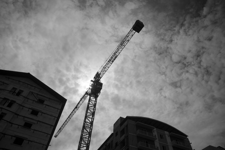 Construction Crane on apartments building siteの写真素材