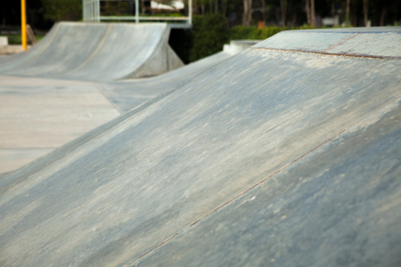 Outdoor concrete skateboard ramp at the parkの写真素材