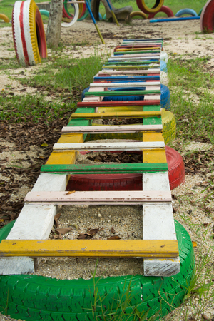 School playground made by rubber tire in Thailandの写真素材