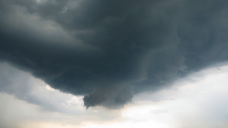 Dramatic black cloud before rainy at thailandの写真素材