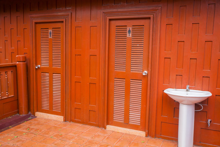 Door and wash basin toilet in thailandの写真素材