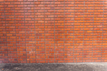 outdoor Red brick wall background texture at thailandの写真素材