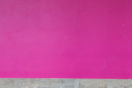 Pink concrete wall and skirt of the buildingの写真素材
