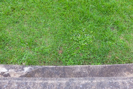 outdoor Stone bench in the park at thailandの写真素材