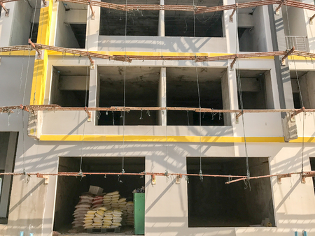 outdoor Building under construction in construction siteの写真素材