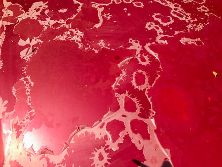 Peeling paint of car bonnet and sun lightの写真素材