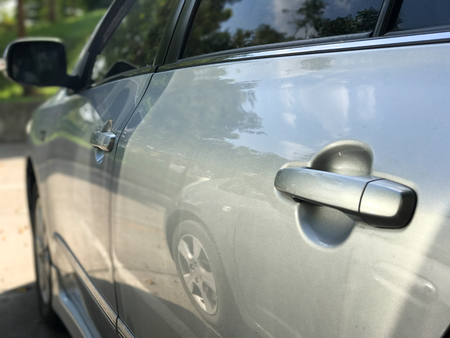close up of car door handle in the parkの写真素材