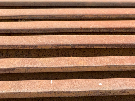 Stack of steel railway at train stationの写真素材