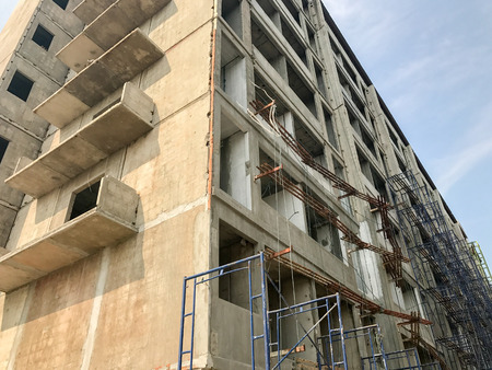 outdoor Building under construction in construction siteの写真素材