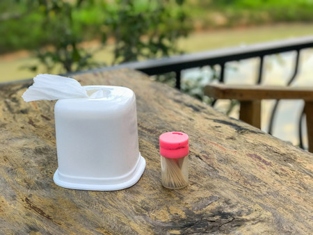 Wooden Toothpick and tissue box at hotel の写真素材