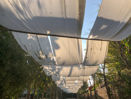 White canvas roof through pathway の写真素材