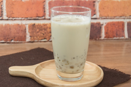  soy milk with barley, jelly, red beans and sesame on glassの写真素材