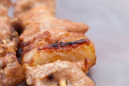 close up of grilled pork skewer chop at thailandの写真素材