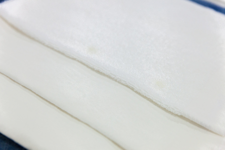 stack of raw cotton in the factoryの写真素材