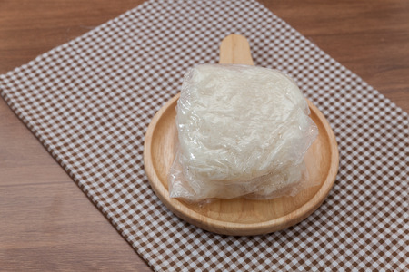 close up of sticky rice served on wood plateの写真素材