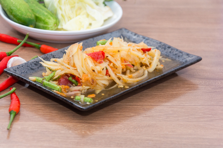 papaya salad (som tum thai) on plateの写真素材