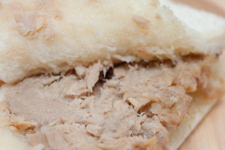 close up of tuna sandwich on wooden plateの写真素材