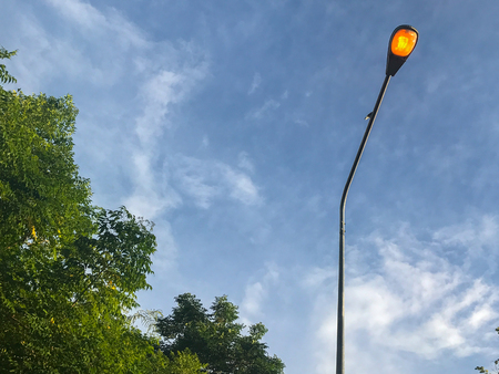 lamp pole in the park at eveningの写真素材