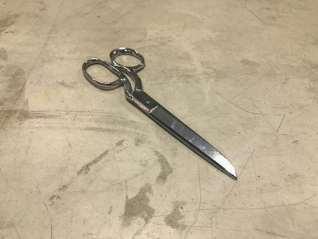 scissors for wool fabric on the tableの写真素材