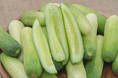 close up of fresh cucumber on sackの写真素材
