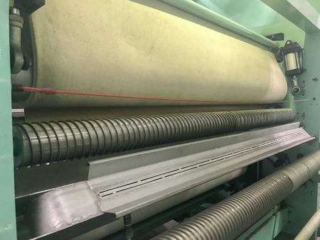 silk textile machine in factory at thailandの写真素材