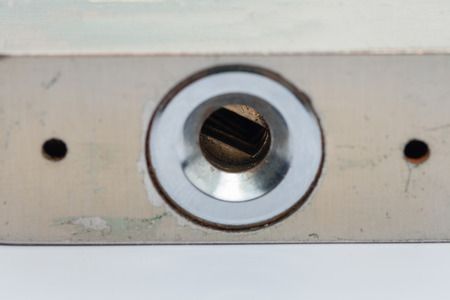 close up of keyhole on pad lockの写真素材