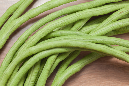 close up of Yard long Bean on wooden tableの写真素材