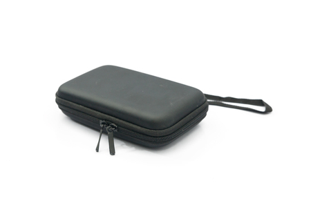 black protection bag with zipper isolated on whiteの写真素材