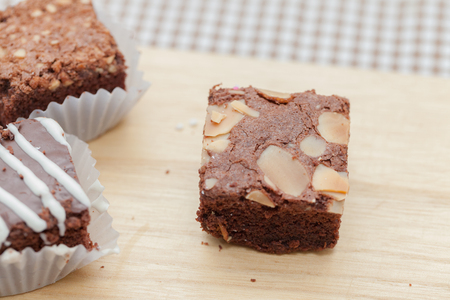 close up of of brownie cake on wooden plateの写真素材