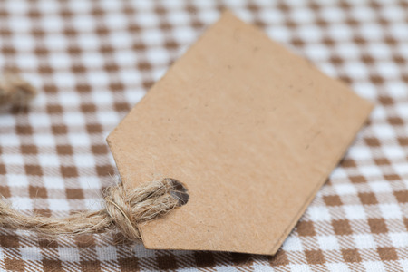 close up of blank brown paper price tagの写真素材