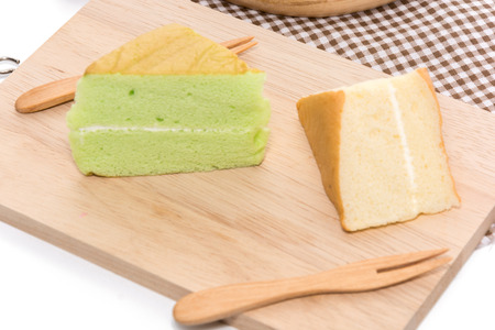 orange and pandan  Chiffon cake on wooden plateの写真素材