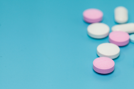 close up of pill on blue backgroundの写真素材