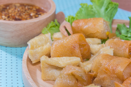 Deep fried spring roll and Fried Tofu with sauceの写真素材