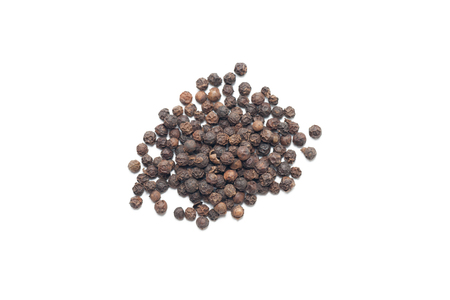Pile of black pepper isolated on white background の写真素材