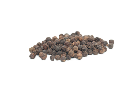 Pile of black pepper isolated on white background の写真素材