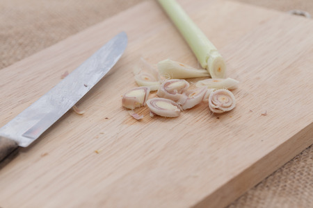 close up of lemon grass on wooden cutting boardの写真素材