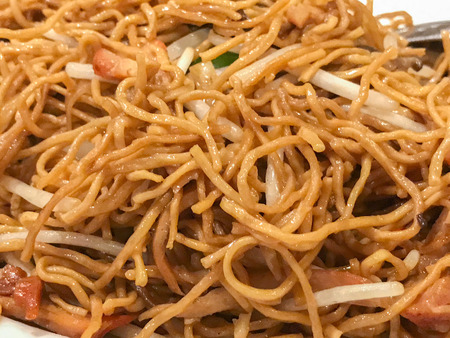 close up of fried egg noodle with roasted porkの写真素材