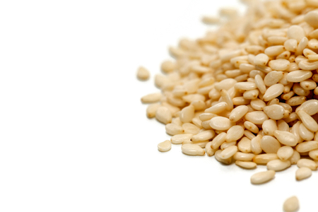 pile of white Sesame on white backgroundの写真素材