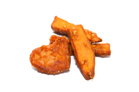deep fried sliced sweet potato on white backgroundの写真素材