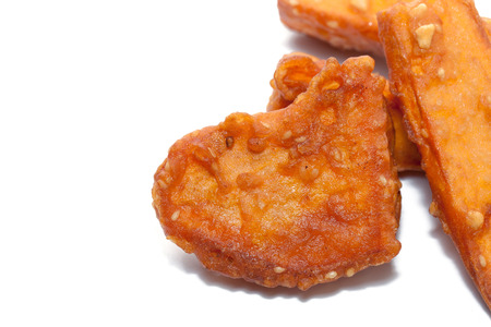 deep fried sliced sweet potato on white backgroundの写真素材
