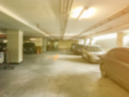 blurry of underground car parking lot at thailandの写真素材