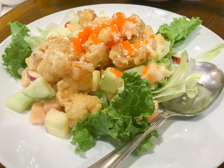 crispy prawn and mix fruit salad mayonnaise sauceの写真素材