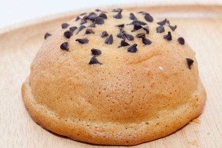 Chocolate Chips Coffee Bun on wooden plate