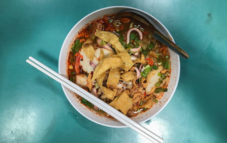 close up of Spicy TOM YAM seafood noodle soupの写真素材