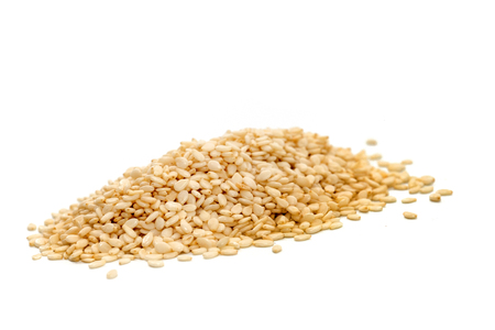 pile of white Sesame on white backgroundの写真素材