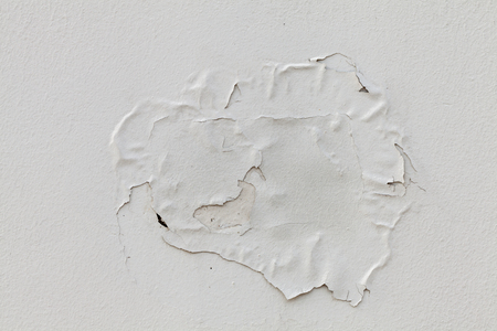 close up of old peeling wall house background textureの写真素材