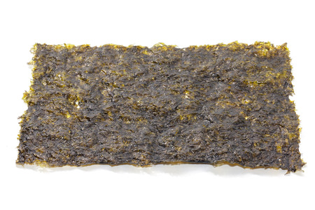 close up of seaweed sheet on white backgroundの写真素材