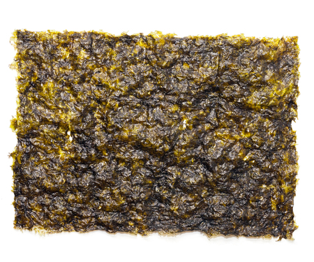 close up of seaweed sheet on white backgroundの写真素材